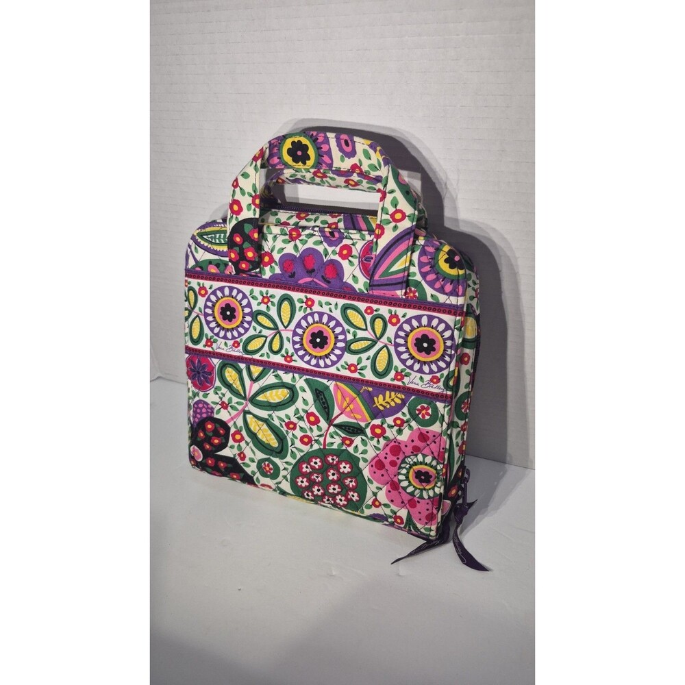 This is a Vera Bradley Tech Organizer featuring the vibrant, multicolored floral